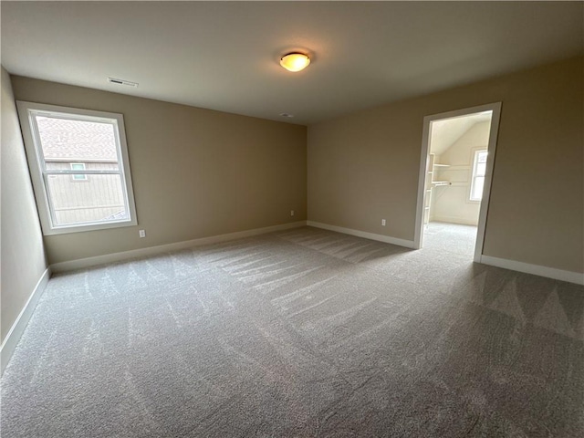 unfurnished room with carpet