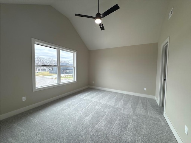 additional living space with vaulted ceiling, light carpet, and ceiling fan