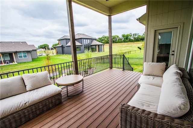 deck featuring an outdoor hangout area and a lawn