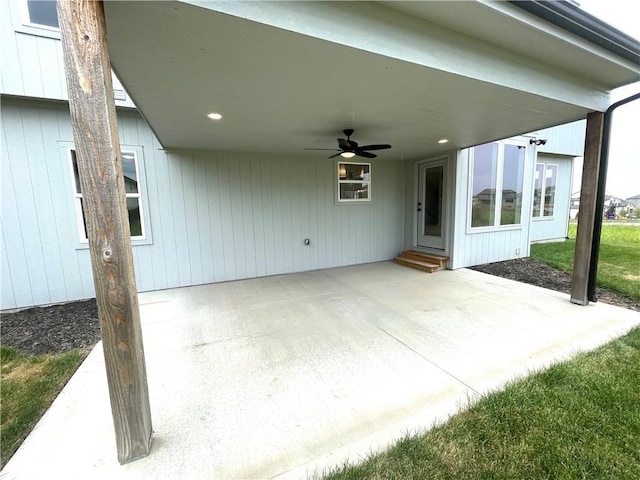 view of patio with entry steps and ceiling fan