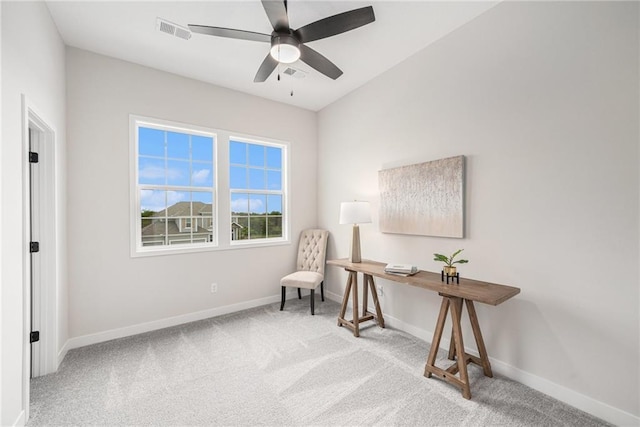 living area with carpet, visible vents, and baseboards