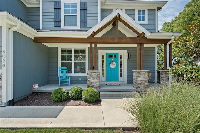 entrance to property with covered porch