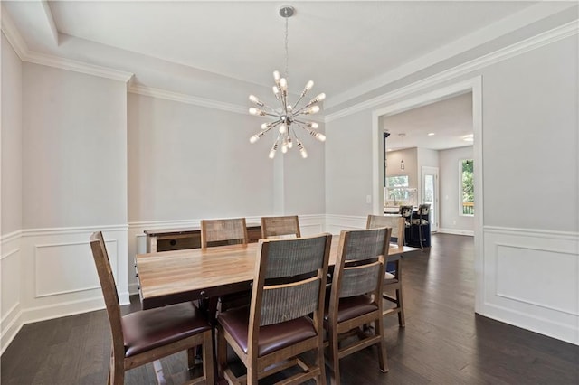 dining space featuring a decorative wall, an inviting chandelier, dark wood-style floors, and a wainscoted wall