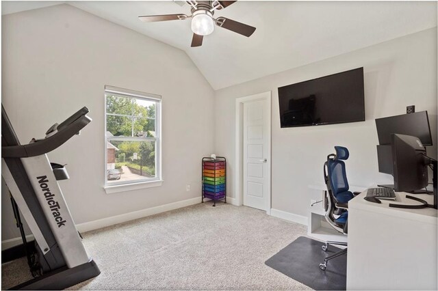 office space featuring carpet, baseboards, a ceiling fan, and lofted ceiling