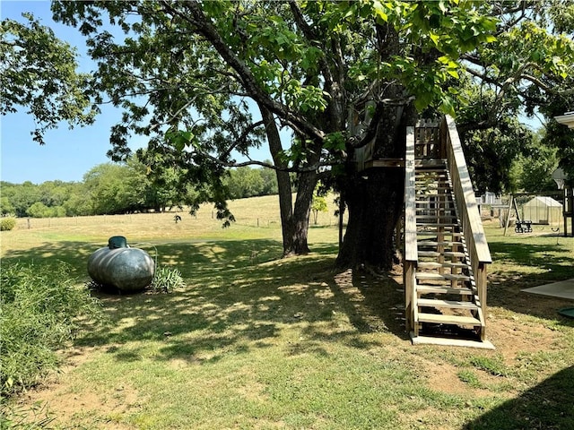 view of playground featuring a yard