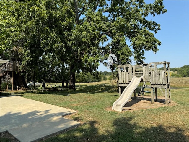 view of play area with a yard