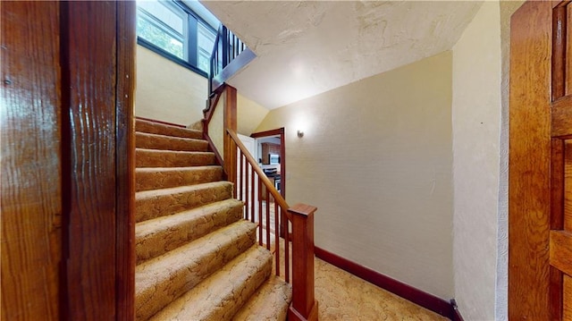 stairs featuring log walls