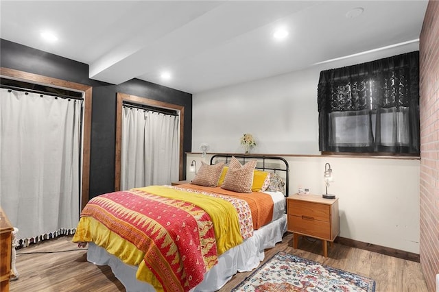 bedroom featuring light wood-type flooring