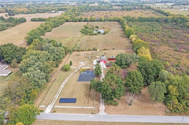 birds eye view of property featuring a rural view