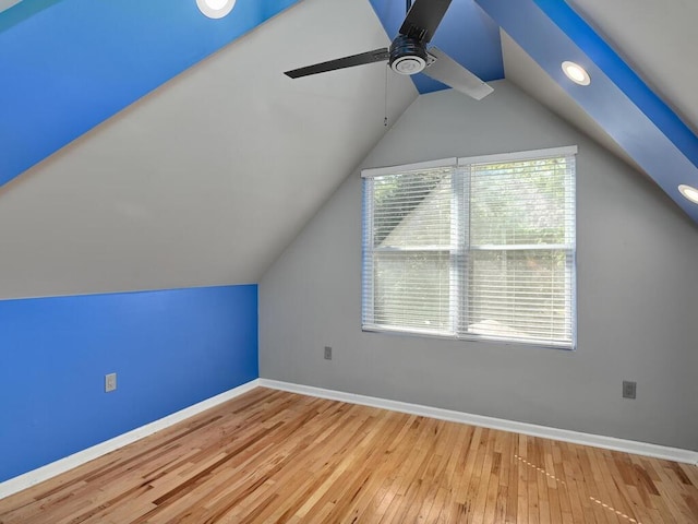 additional living space featuring lofted ceiling, wood-type flooring, and ceiling fan