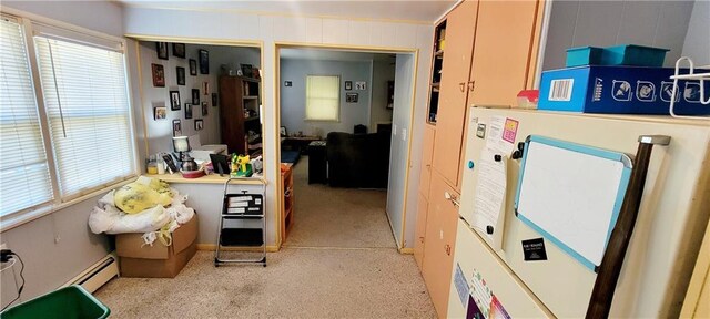 kitchen featuring a baseboard heating unit