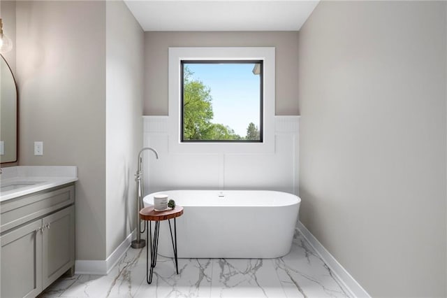 bathroom with vanity and a bathing tub