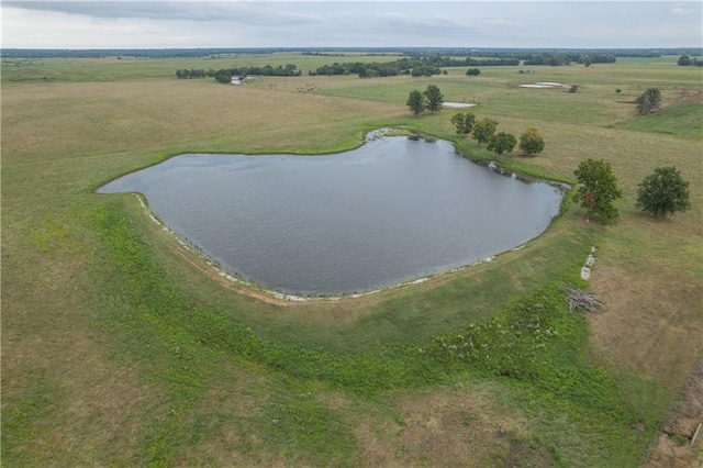 drone / aerial view with a rural view and a water view