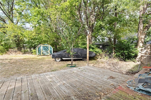 wooden deck with a storage unit