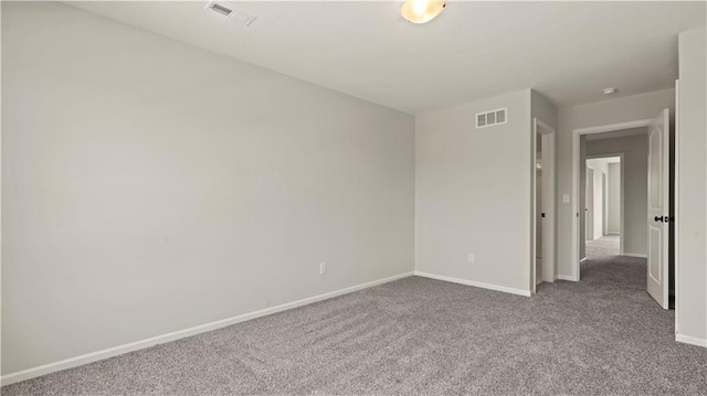 spare room featuring carpet flooring