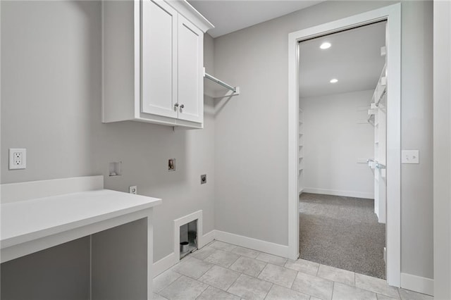 laundry room with hookup for a washing machine, recessed lighting, cabinet space, electric dryer hookup, and baseboards