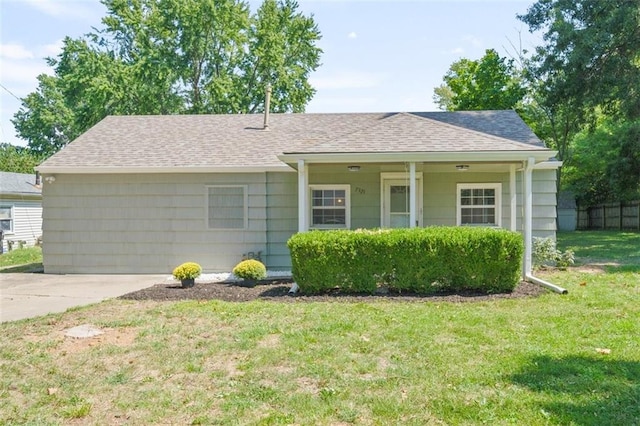 ranch-style house with a front lawn