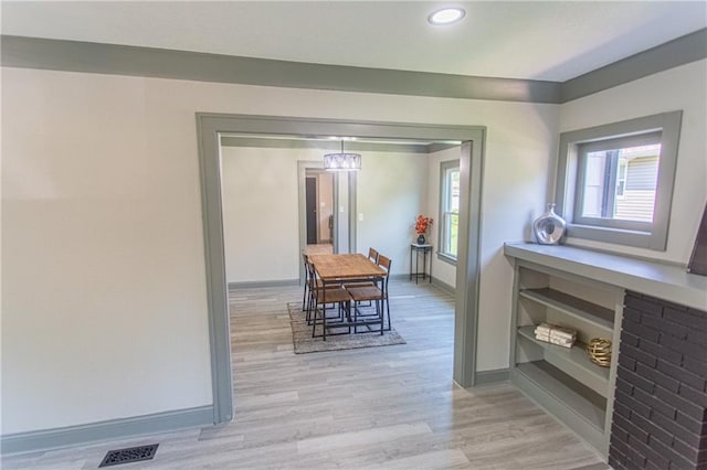 dining space featuring light hardwood / wood-style floors