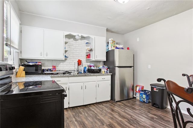 kitchen with stainless steel appliances, dark hardwood / wood-style floors, backsplash, and white cabinetry