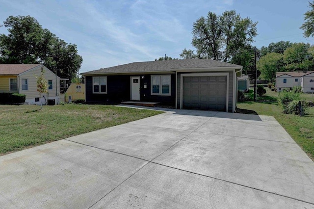 single story home with a garage and a front yard