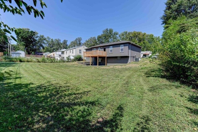 view of yard with a deck