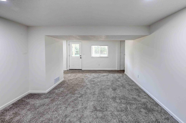 spare room featuring carpet flooring