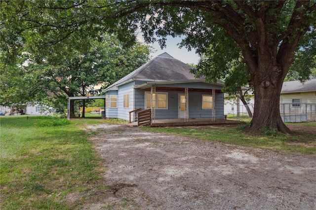 view of front of home with a front lawn and a porch