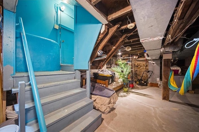 3917 Benton Blvd, Kansas City, MO 64130 - stairs with unfinished concrete floors