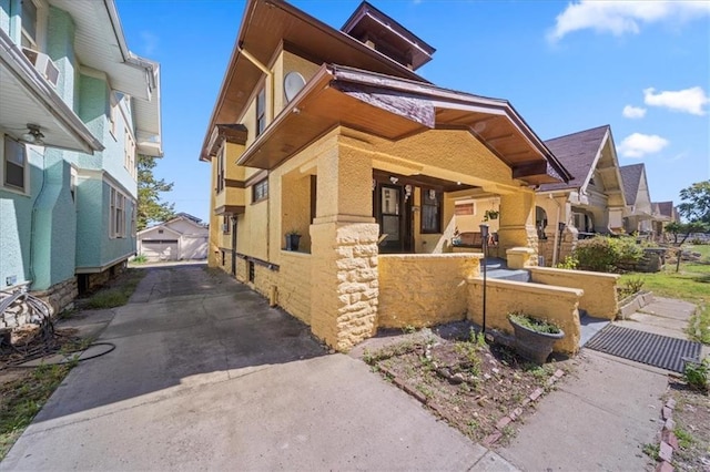 3917 Benton Blvd, Kansas City, MO 64130 - view of property with a detached garage