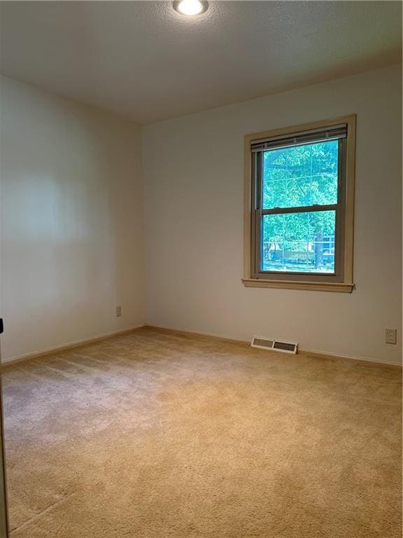 empty room with light carpet