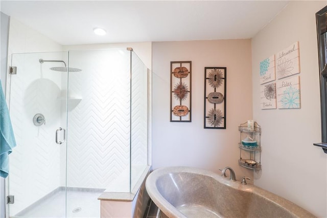 full bathroom featuring a stall shower and a garden tub