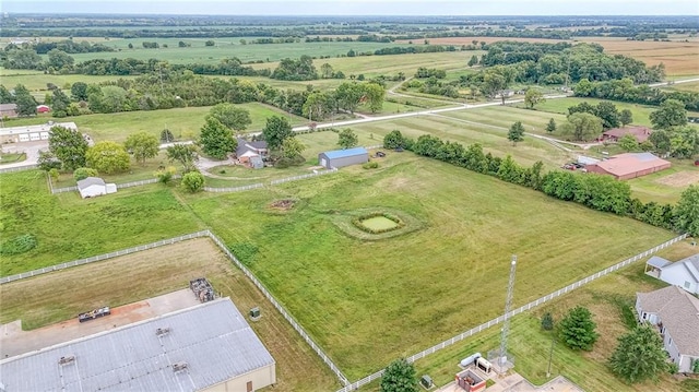 birds eye view of property featuring a rural view