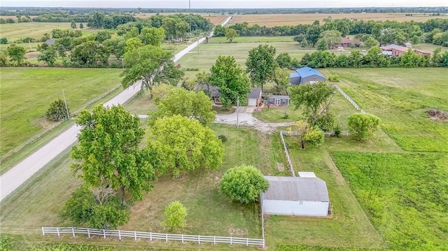 birds eye view of property featuring a rural view