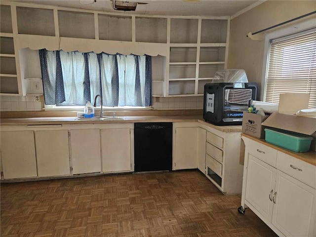 kitchen with dark parquet flooring, black dishwasher, tasteful backsplash, and sink