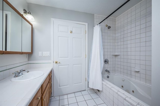 bathroom with tile patterned flooring, shower / tub combo, and vanity