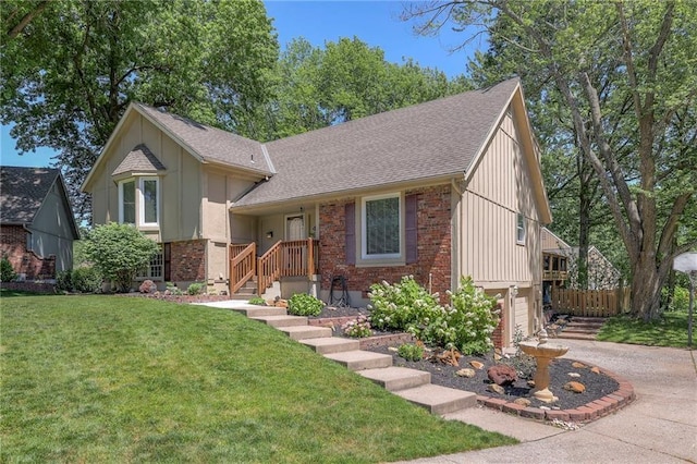 view of front of house with a garage and a front yard