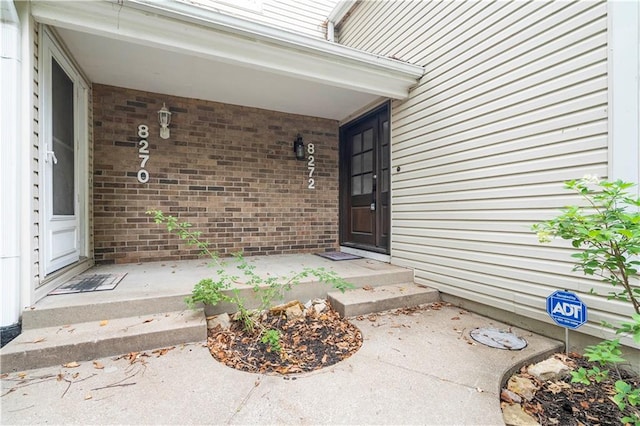 doorway to property with covered porch