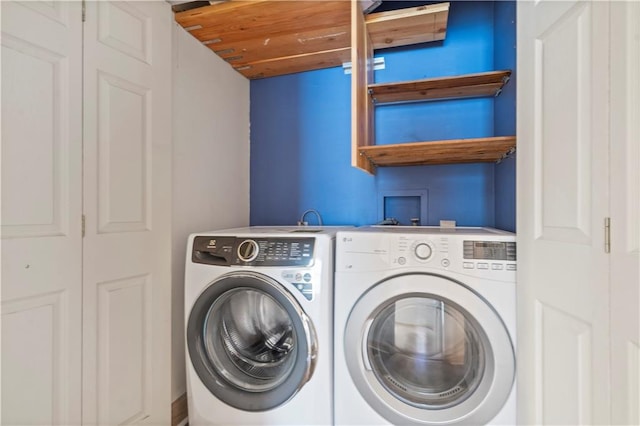 laundry room featuring independent washer and dryer