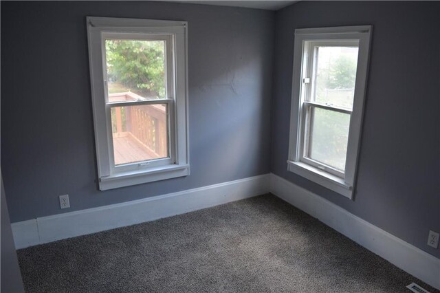 view of carpeted spare room