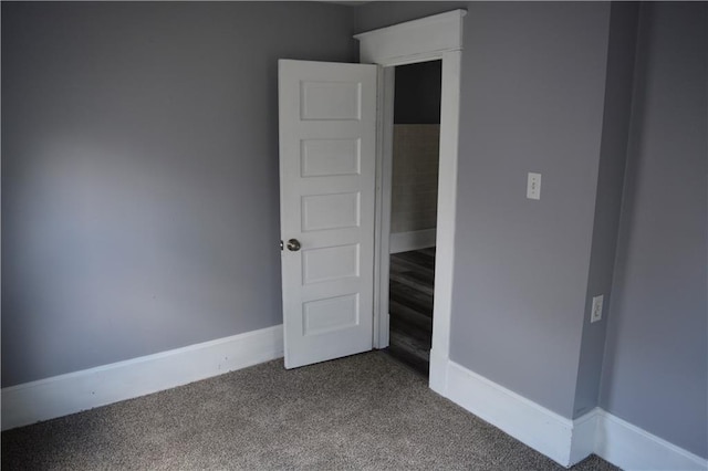 unfurnished bedroom featuring carpet