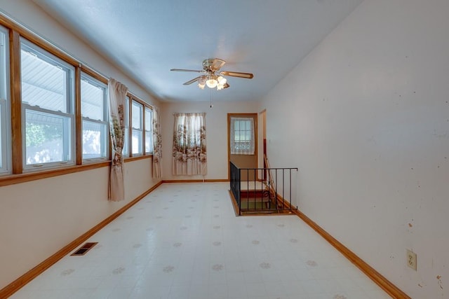 spare room featuring ceiling fan