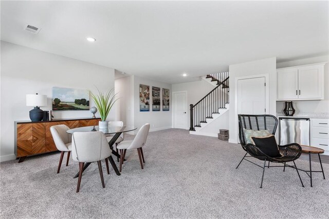 view of carpeted dining room