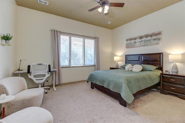 bedroom featuring ceiling fan and light colored carpet