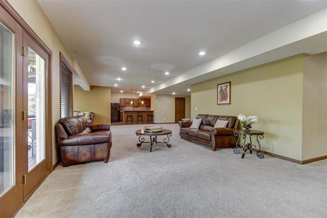 carpeted living room featuring a wealth of natural light