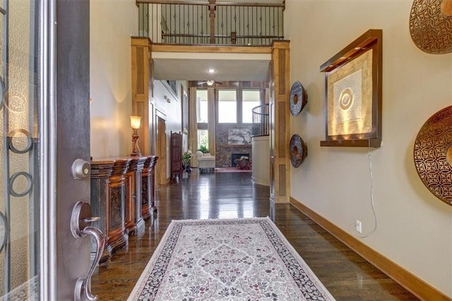 foyer entrance featuring dark hardwood / wood-style flooring