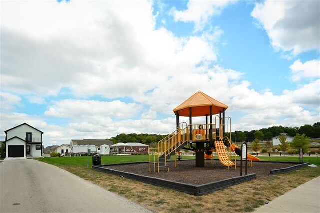 view of playground featuring a lawn