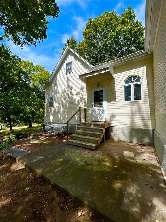 back of property with a patio area