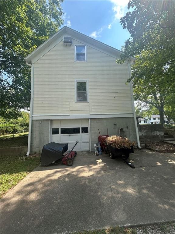 view of home's exterior featuring a garage