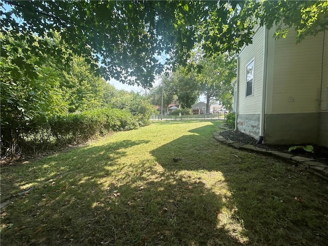 view of yard with fence