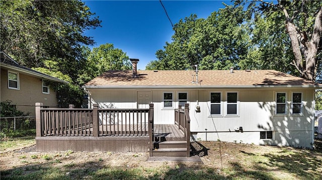 rear view of house with a deck